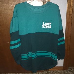 Green long sleeved shirt